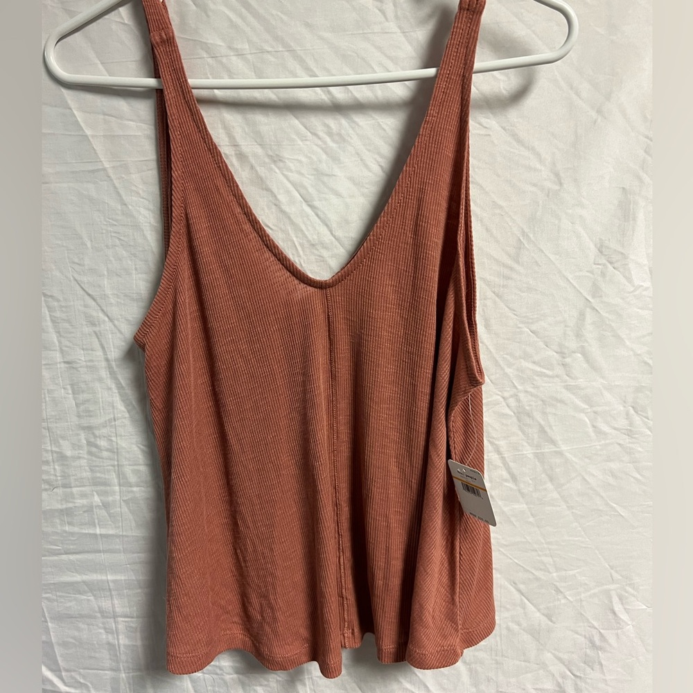 Free people tank top new with tag small fits like a normal large